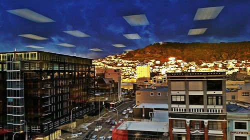 Buildings in city against sky