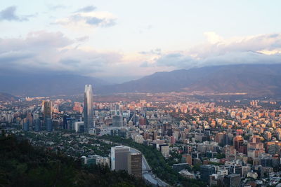 High angle view of city at sunset