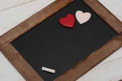 High angle view of heart shape on cutting board
