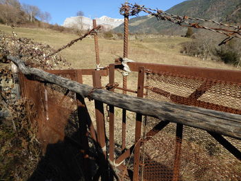 Close-up of barbed wire against sky