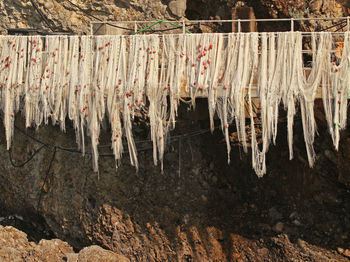 Fishing nets on bridge railing at camogli