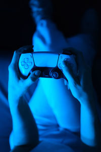 Close up game console in hands