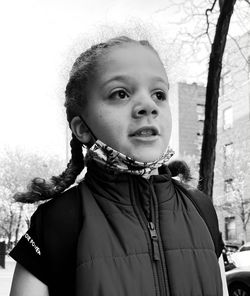 Portrait of girl standing in snow