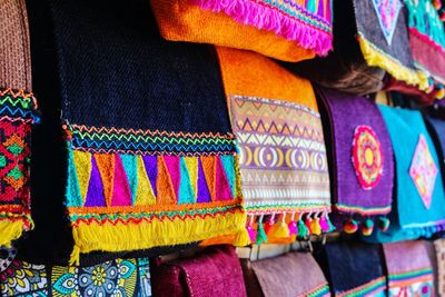Colorful scarfs on wall - gallery shop - siwa - egypt