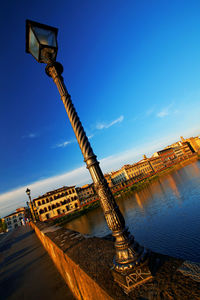 Low angle view of street light against sky