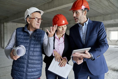 Business colleagues working at office