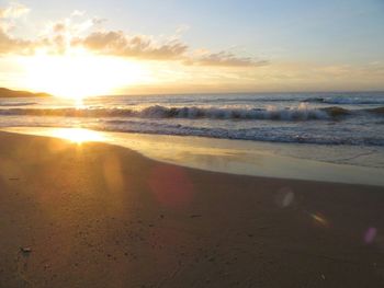 Scenic view of sea at sunset