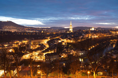 High angle view of illuminated buildings in city