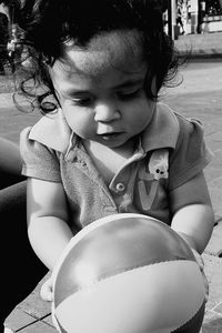 Boy sitting on chair