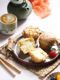 Vanilla soes cakes or soes vla served in plate. selective focus