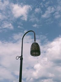 Low angle view of street light against sky