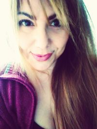 Close-up portrait of smiling woman