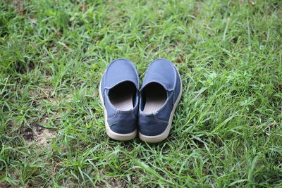 High angle view of shoes on field
