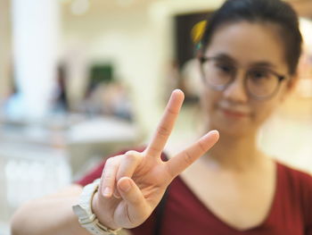 Portrait of woman with hands