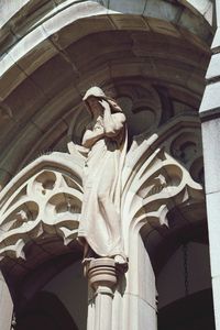 Low angle view of angel statue in temple
