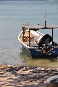 Boat moored on sea