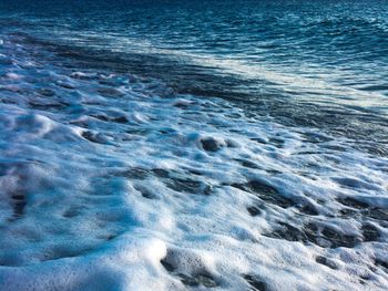 High angle view of waves in sea