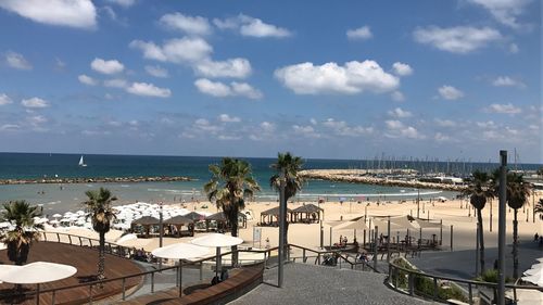High angle view of swimming pool by sea against sky