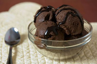 Close-up of chocolate ice cream in bowl on table