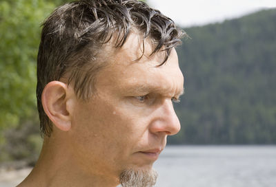 Close-up of thoughtful mature man looking down