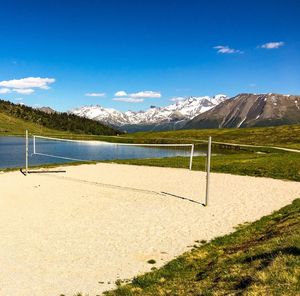 Scenic view of landscape against blue sky