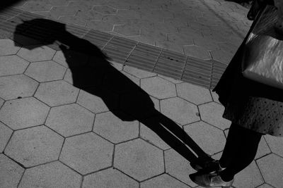 Shadow of woman on wall