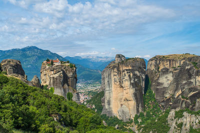 Panoramic view of rock formations against sky