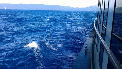 Scenic view of sea against blue sky