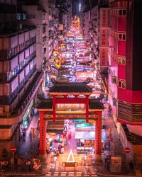 Illuminated buildings in city at night