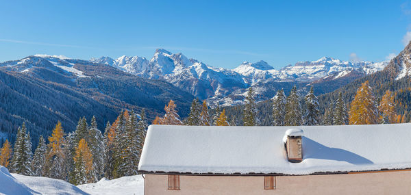 Awesome winter scenery behind an alpine hut, val fiorentina, dolomites