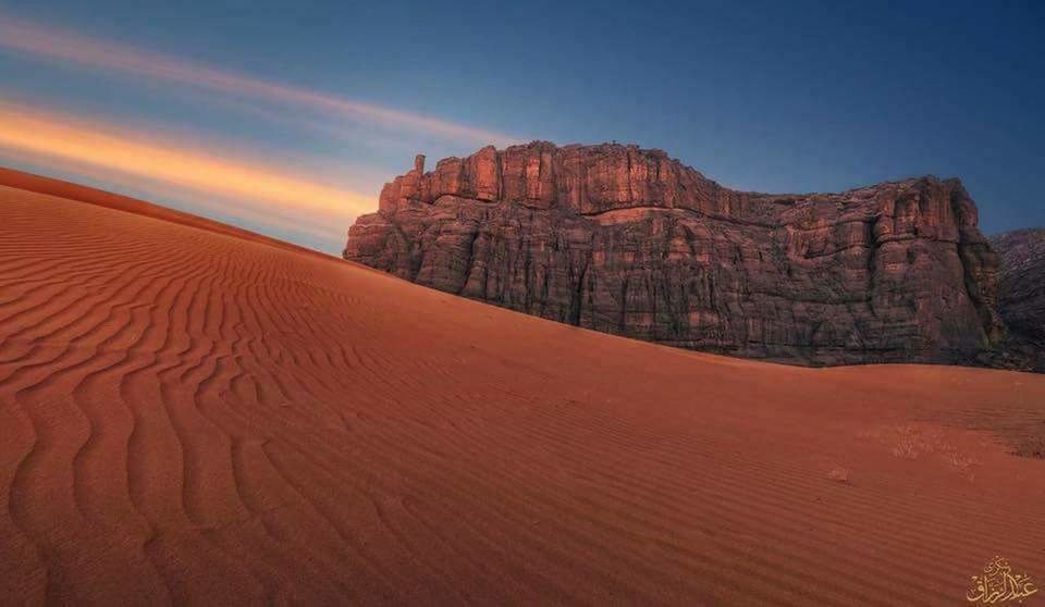 scenics - nature, beauty in nature, desert, land, landscape, tranquil scene, rock formation, rock, non-urban scene, sky, tranquility, rock - object, environment, nature, solid, physical geography, sand, no people, remote, travel destinations, climate, arid climate, eroded, outdoors, sandstone