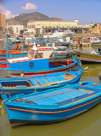 Boats moored in harbor