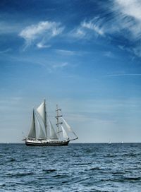 Sailboat sailing in sea