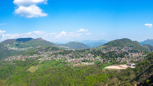 Aerial view of townscape against sky