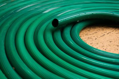 Close-up of green pipe on floor