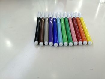 High angle view of multi colored pencils on table