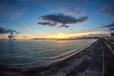 Scenic view of sea against sky during sunset