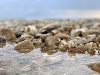 Close-up of stones on beach