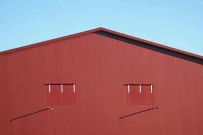 Close-up of red building against clear sky