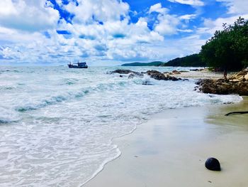 Scenic view of beach against sky