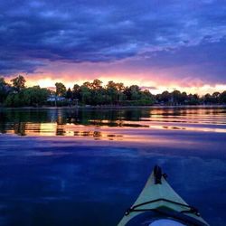 Scenic view of lake at sunset