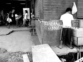 People in front of building