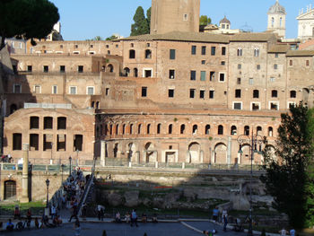 Group of people in front of historical building