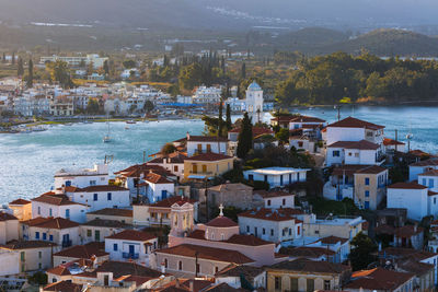 High angle view of townscape by sea