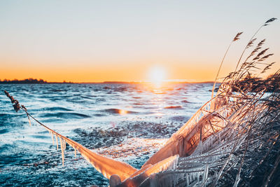 Scenic view of sea against sky during sunset