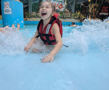 Young woman in swimming pool