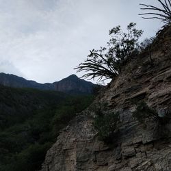 Scenic view of rocky mountains against sky