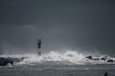 Picturesque view of the stormy sea against the sky