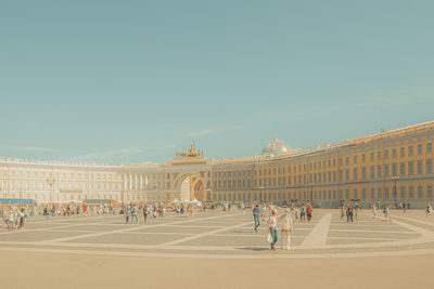 Group of people in front of historical building