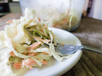 Close-up of salad in bowl on table